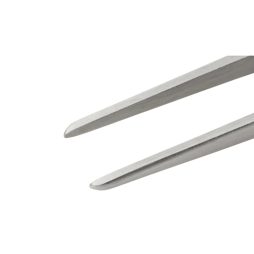Reversible tweezers with wide rounded tips