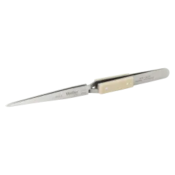 Reversible tweezers with wide rounded tips